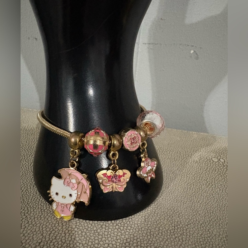 Gold and Pink Charm Bracelet - Picture 16 of 16